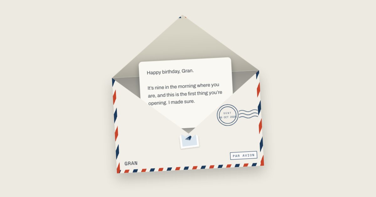 A red, white and blue airmail envelope marked Par Avion, open, with a letter beginning “Happy birthday, Gran”