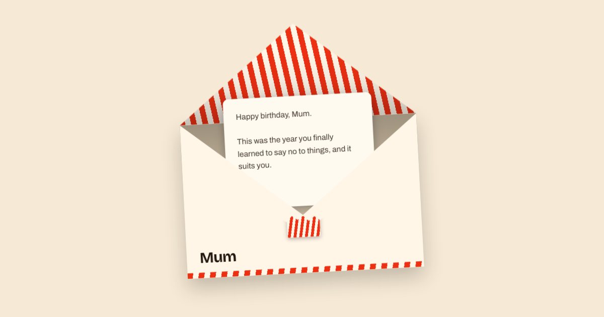 A cream envelope lined with red and white stripes, open, with a letter beginning “Happy birthday, Mum”